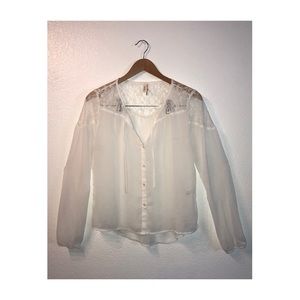 Frenchi Sheer Long Sleeve Front Tie Top. Bell sleeves.